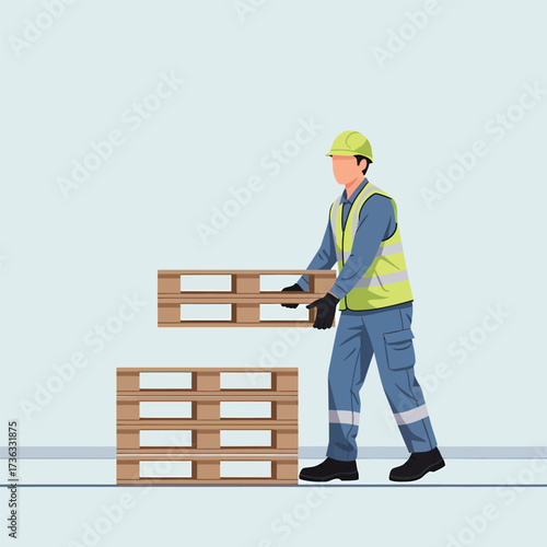 Warehouse worker stacking wooden pallets with safety gear.
