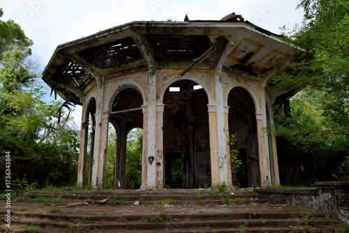 An abandoned ruined old building is a building in the forest
