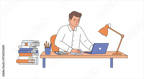Man working on laptop at office desk