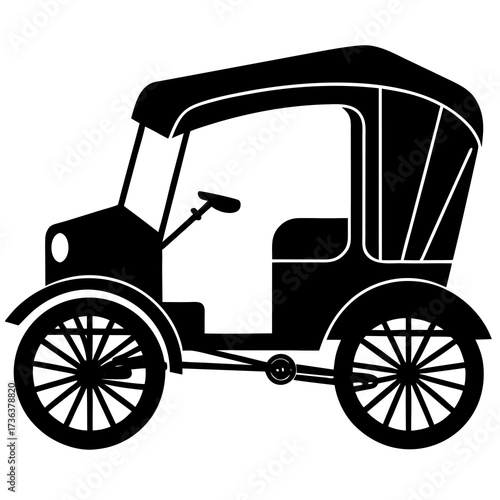 Classic black silhouette of an old fashioned automobile with a canopy top and spoked wheels