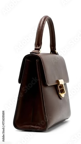 Elegant brown handbag with structured design, showcased against a minimalistic white background