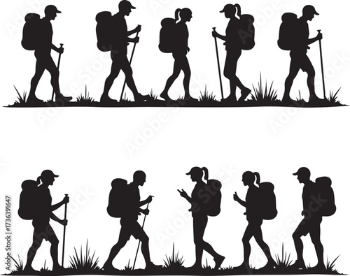 Silhouettes of hikers with backpacks and trekking poles walking on grass