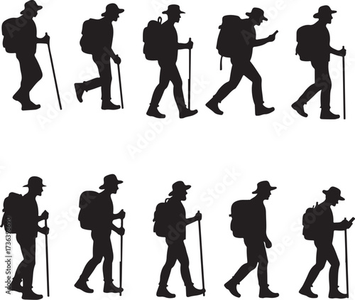 Silhouette hikers with backpacks and walking sticks in motion