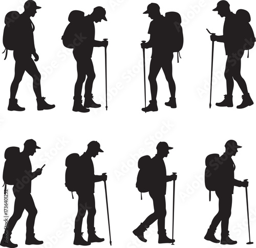 Silhouette hikers with backpacks and walking sticks