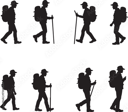 Silhouette hikers walking with backpacks and poles