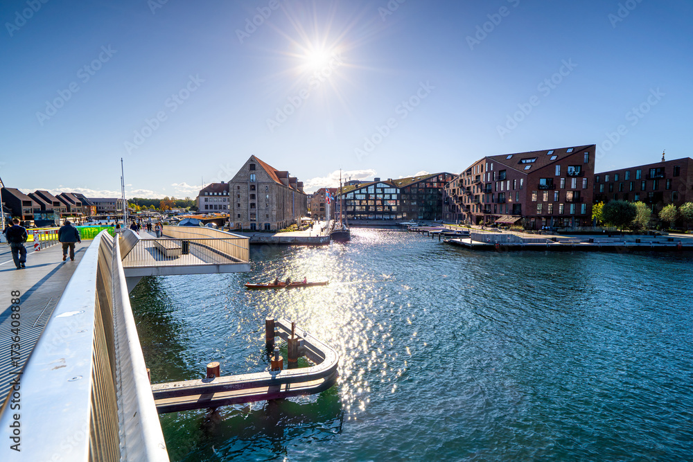 Obraz premium View of modern urban architecture from Inderhavnsbroen Bridge in Copenhagen. Scandinavian coastal city, Denmark.