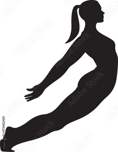 Black silhouette of a woman in a dynamic yoga pose