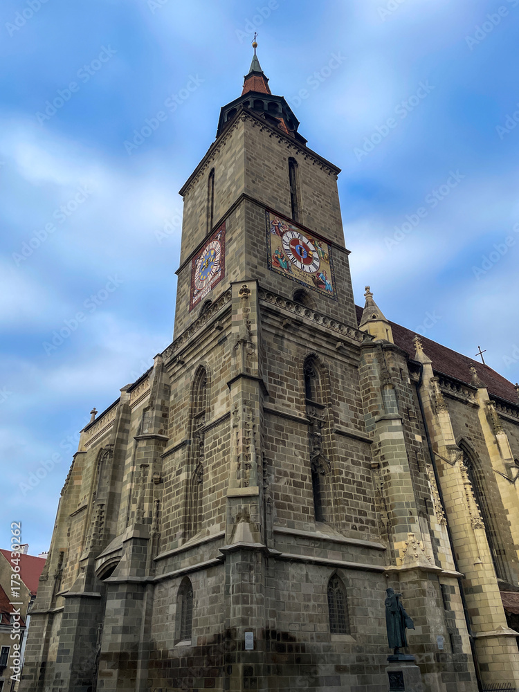 Fototapeta premium Gothic church with clock tower in Brasov, Romania