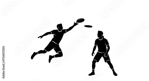 Silhouette of Two People Playing Flying Disc, One in Mid-Air Jump