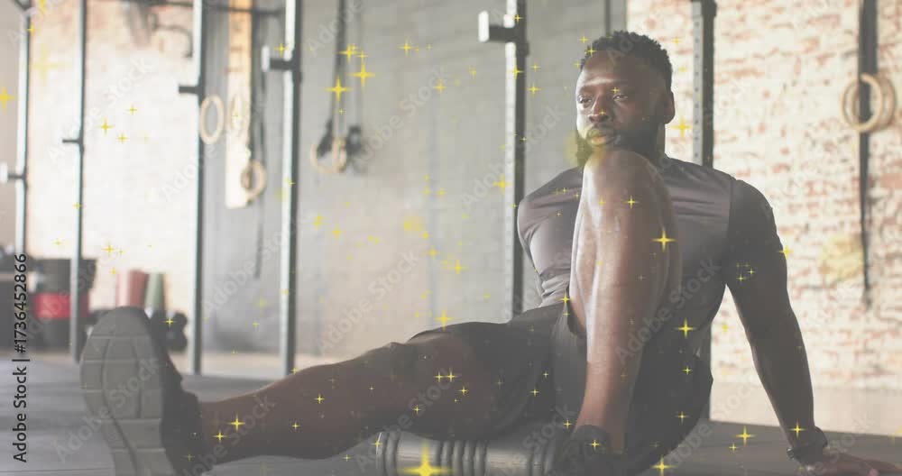 Rolling Pin Hamstrings Fitness athlete using foam roller initiating hamstring rolling for ...