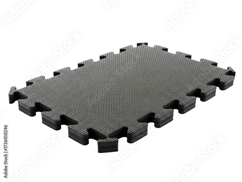 Black textured puzzle mat for exercise and protective flooring on a transparent background