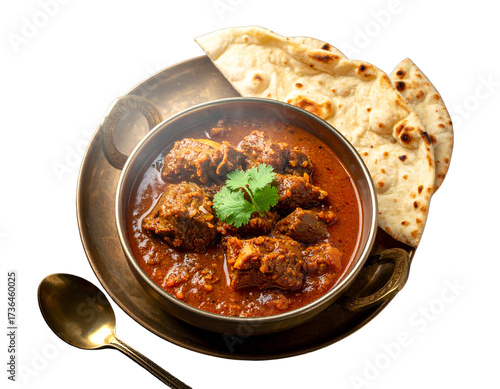 Authentic Lamb Rogan Josh in Traditional Brass Bowl Isolated
