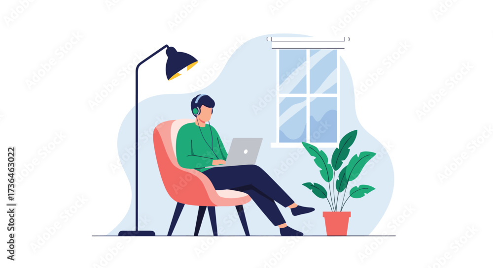 Obraz premium Man working on laptop while listening to music at home.