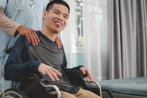 A young man with disability and a kind doctor encourage to patient in examination room, Activity in hospital , home, quarantine, Symptom monitoring and consultation by a specialist,Healthcare concept.