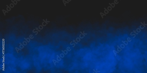 Abstract blue smoke moves on black background.Beautiful swirling blue smoke. Wide angle horizontal wallpaper or web banner.