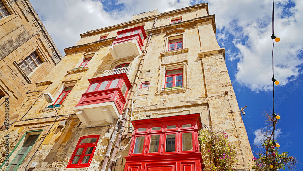 custom made wallpaper toronto digitalSunlit Valletta corner with stacked red wooden balconies on warm limestone walls under blue sky