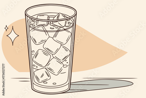 Tall glass filled with ice cubes and clear liquid with shadow and sparkle drink