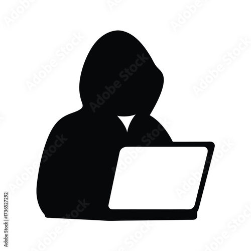 Silhouette of a hooded figure intensely focused on a laptop screen in a dark setting