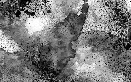 Abstract grunge texture in monochrome shades of black and gray with rough, splattered, and uneven patterns. Ink splashes, dust, or concrete stains with overlays, posters, or digital artwork