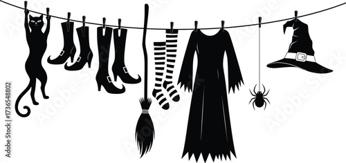 Halloween laundry line with witch costume cat spider and broom in black silhouette