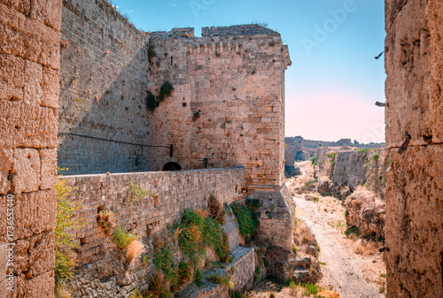 The medieval city walls, part of the fortification of the old town of Rhodos and the medieval moat. In Rhodos Island, Dodecanese, Greece.