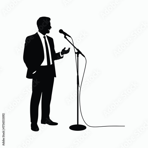 Man in suit speaking at a microphone silhouette Keywords: man, suit, speaking, microphone, silhouette