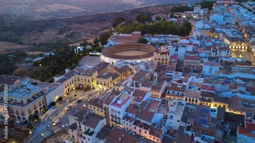 Aerial 4K sunset drone view of bullring and historic town in Ronda Spain