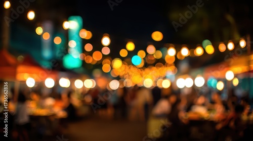 Wallpaper Mural Blurry nighttime outdoor festival with warm string lights Torontodigital.ca