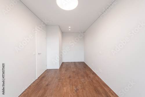 Empty white walls room corner and LED Light. Interior with empty room with white walls and wooden floor.