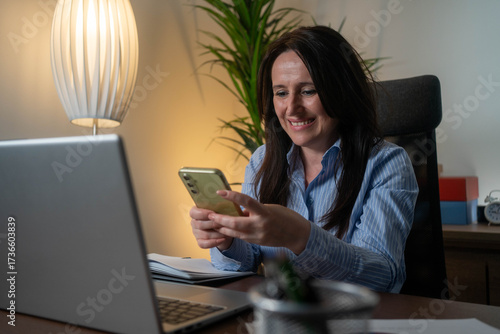 Businesswoman using cell phone
