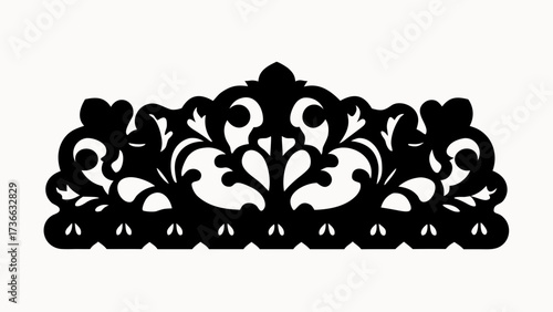 Black cut out floral pattern with symmetrical swirls and heart shaped accents on a white background design