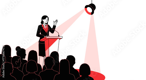 Female speaker giving a presentation at a conference with an audience looking on