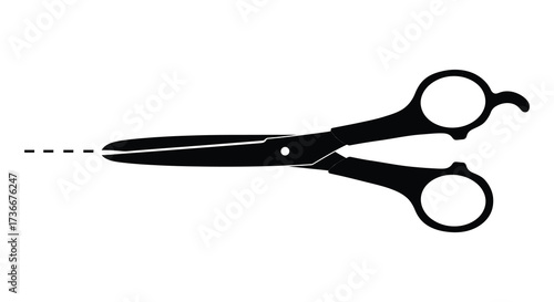 Professional black hairdressing scissors cutting a dashed line for salon services and hair care