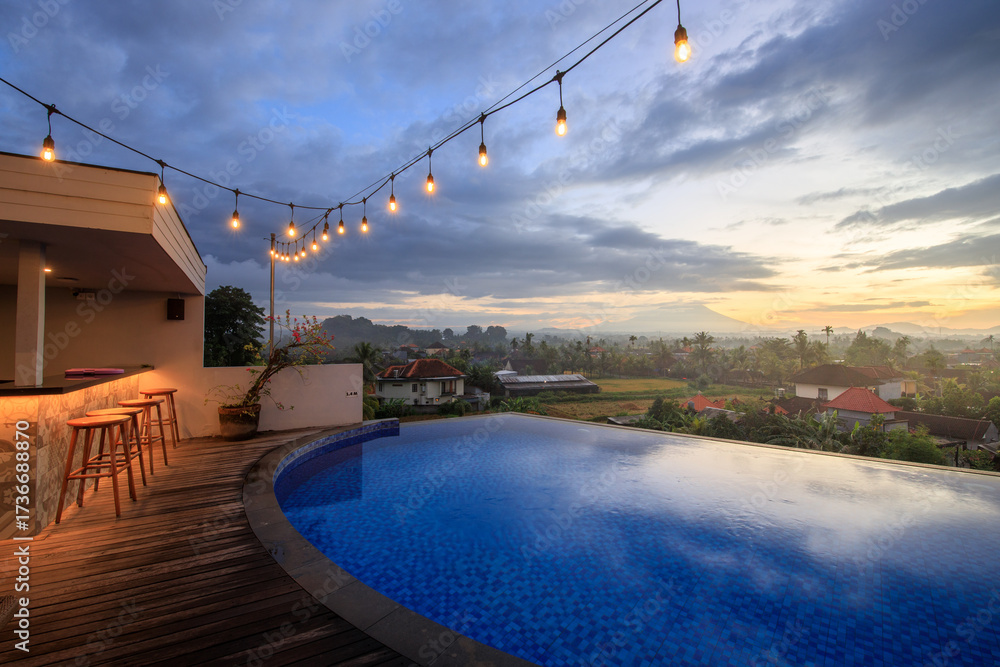 Obraz premium Pool with a view of the city and mountains