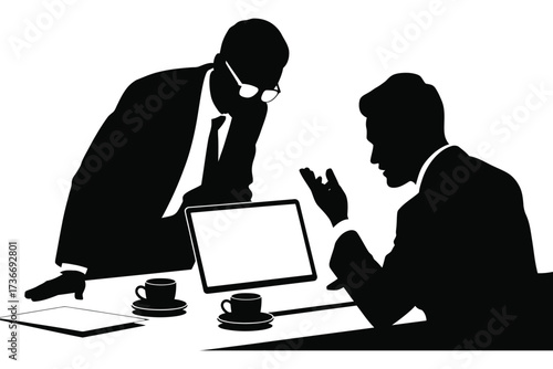 Business professionals in silhouette discussing work at a desk with a laptop