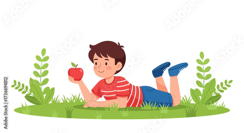 Joyful Boy Holding a Red Apple Relaxing on Green Grass Beneath a Clear White Sky