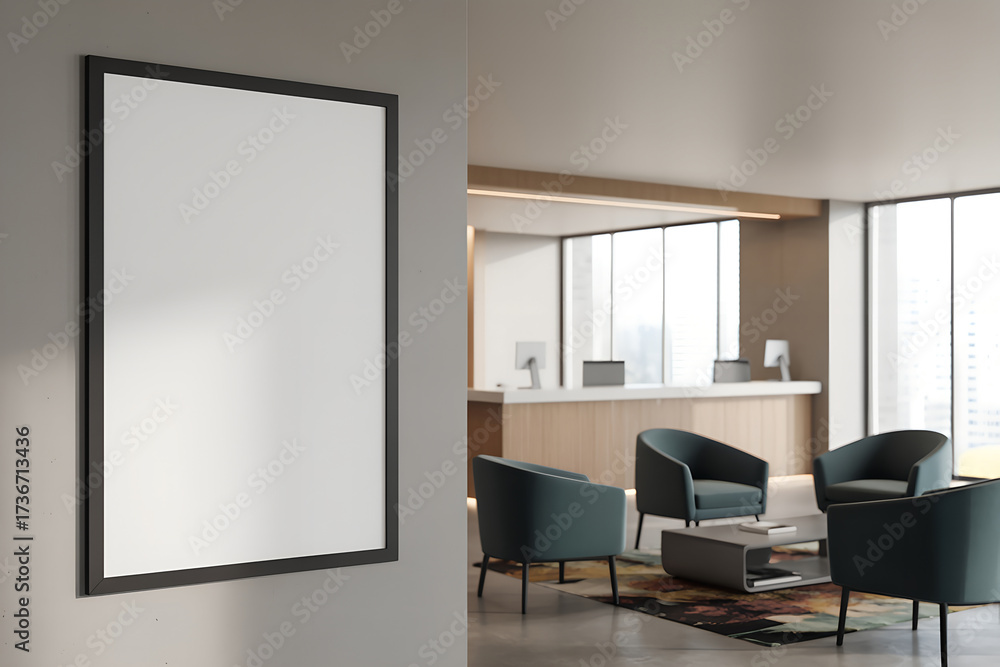 Fototapeta premium Blank framed poster hanging on a wall in a modern hotel lobby waiting area