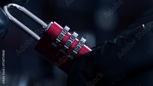 Person in glows opening Coding Lock For Luggage And Lockers In Hands