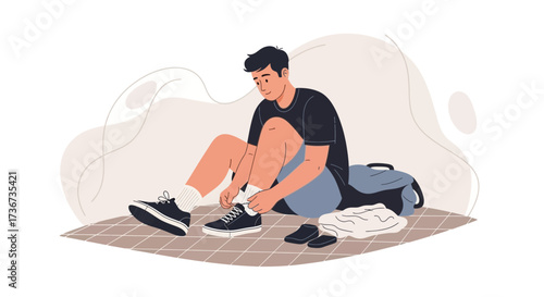 Preparing For Practice: A Young Athlete Lacing His Running Shoes Or Sneakers
