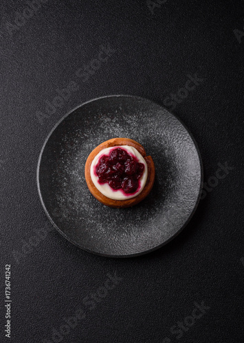 Cinnamon roll, a sweet bun with citrus, cherries, and chocolate, a Danish dessert with cream