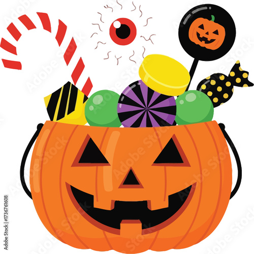 Spooky halloween pumpkin bucket overflowing with colorful candies and treats for trick or treat