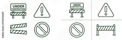 Various construction warning signs and symbols showing safety guidelines at a work site