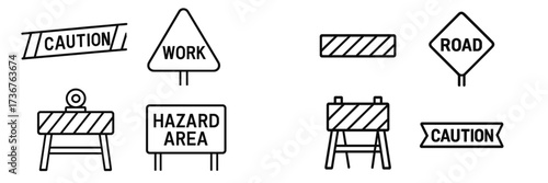 Safety signs and traffic warnings displayed in a construction zone during daytime
