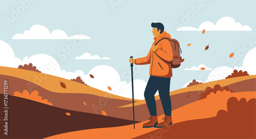 Man hiking in autumn landscape with backpack and walking stick under a cloudy sky