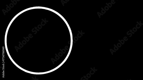 Simple white circle outline geometric shape on a solid black background, minimalist graphic element or frame for design projects, copy space.