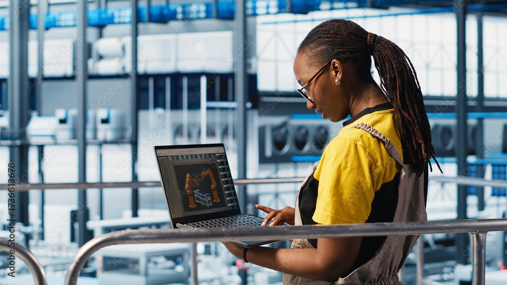 Fotografie Engineers working in smart factory, collecting and analyzing data