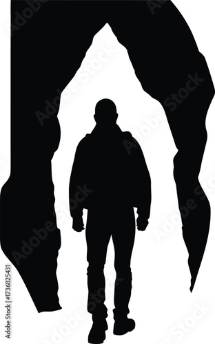 Silhouette of a lone person standing in a cavern entrance isolated on white background silhouette