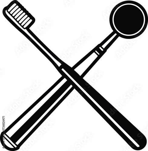 Silhouette of crossed dental tools a toothbrush and a mirror isolated on white background