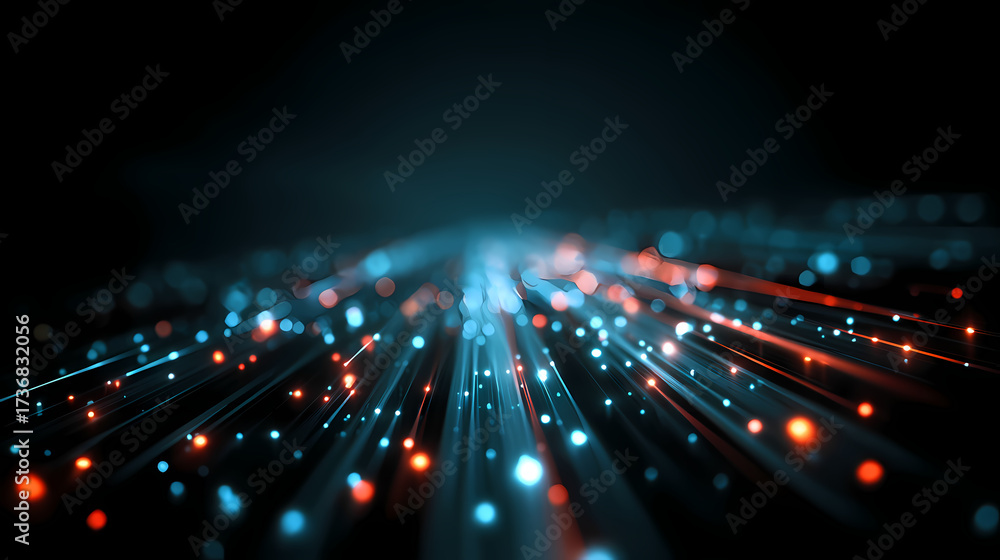 Obraz premium Data Stream Blue and Orange Light Streaks on a Dark Background