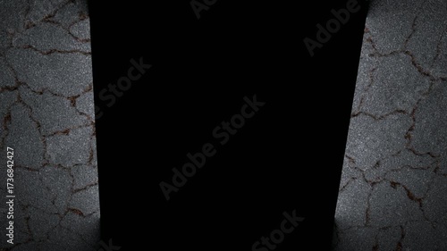 Parched, cracked earth split by a dark central fissure, with dim, moody lighting.A stark desert lit